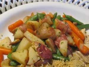 Budding Vegetarian: Sauteed carrots & sugar snaps w/roasted potatoes in garlic butter sauce